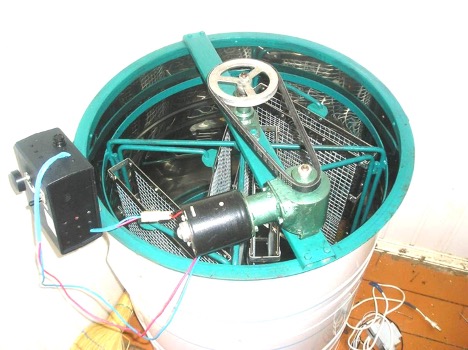 Approximate view of a finished honey extractor with electric drive