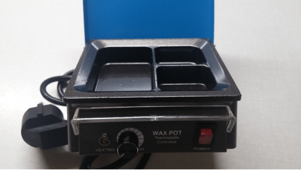 Electric wax refiner 