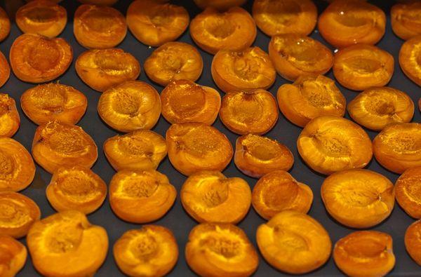 dried apricots on a baking sheet